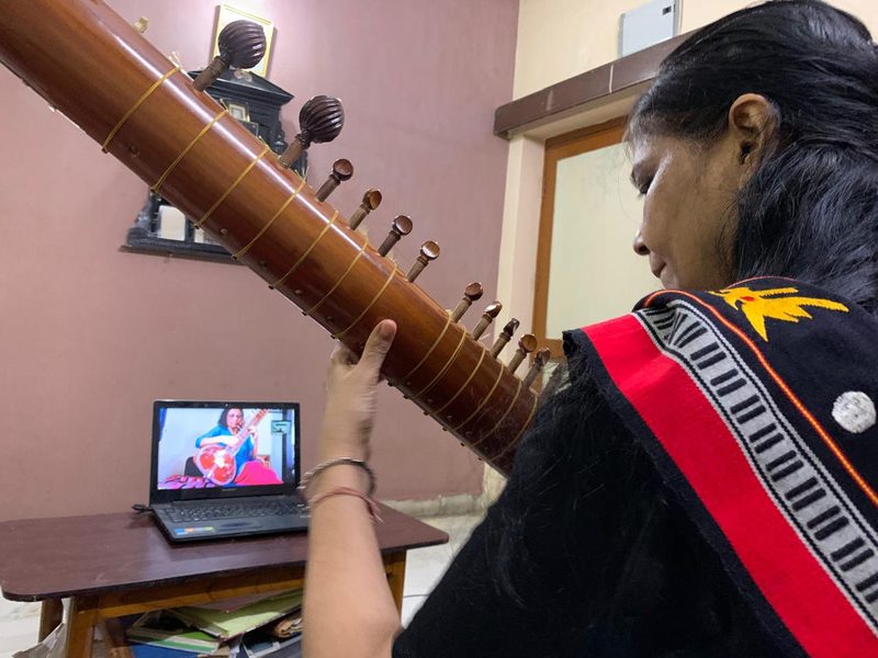 Sitar student learning via Zoom at Kala Kuteer
